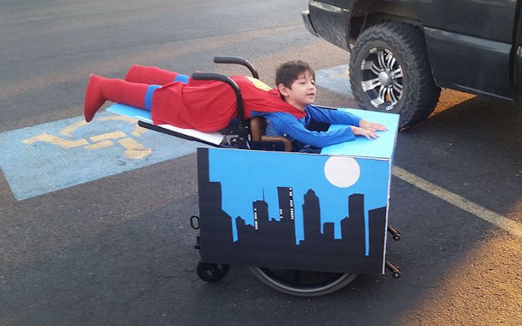 boy in superman wheelchair costume
