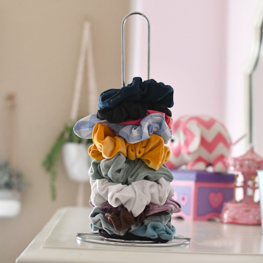 dollar tree paper towel holder as a scrunchie organizer
