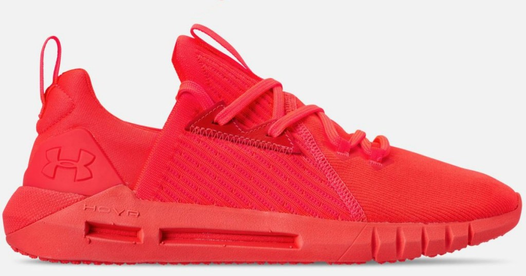 red pair of shoes on white background