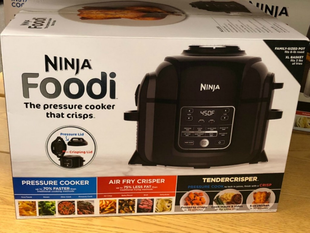 box with kitchen appliance in it on store shelf