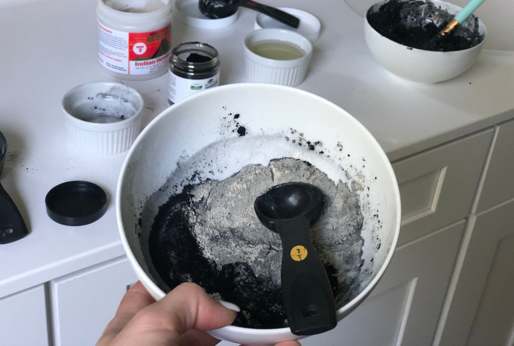 bowl of gray and black powder in bowl