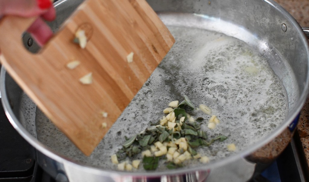 sautéing garlic for pumpkin fettuccine alfredo