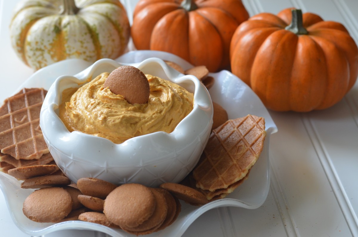 autumn dip on table with cookies and pumpkins