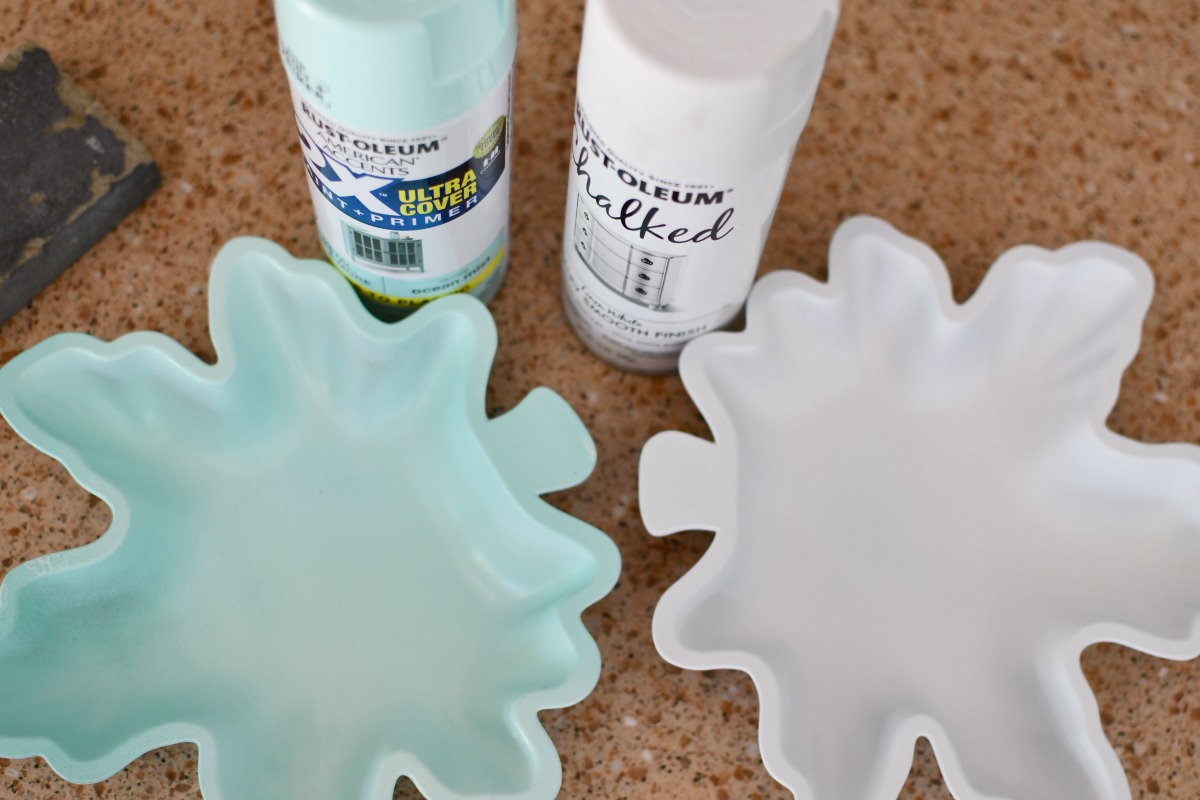 spray paint and leaf dishes on counter