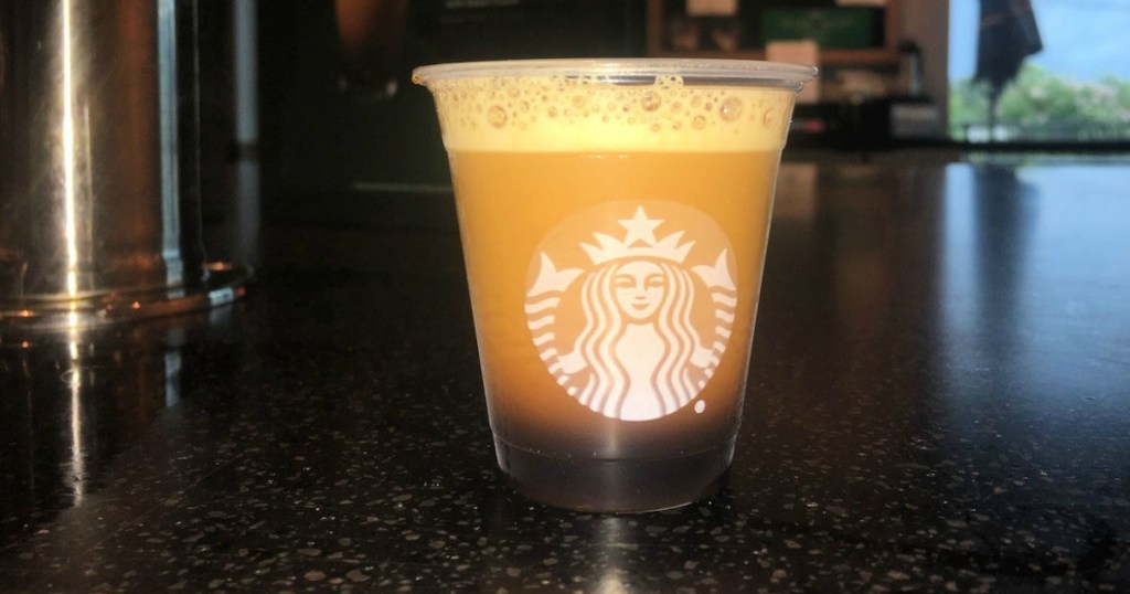 shot of starbucks coffee on counter