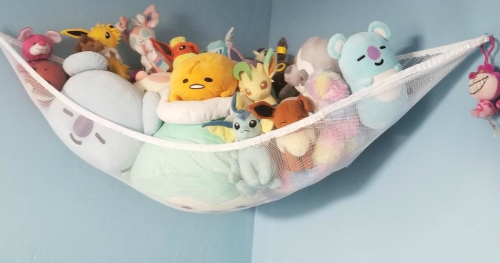 stuffed animal toy hammock hanging on wall 