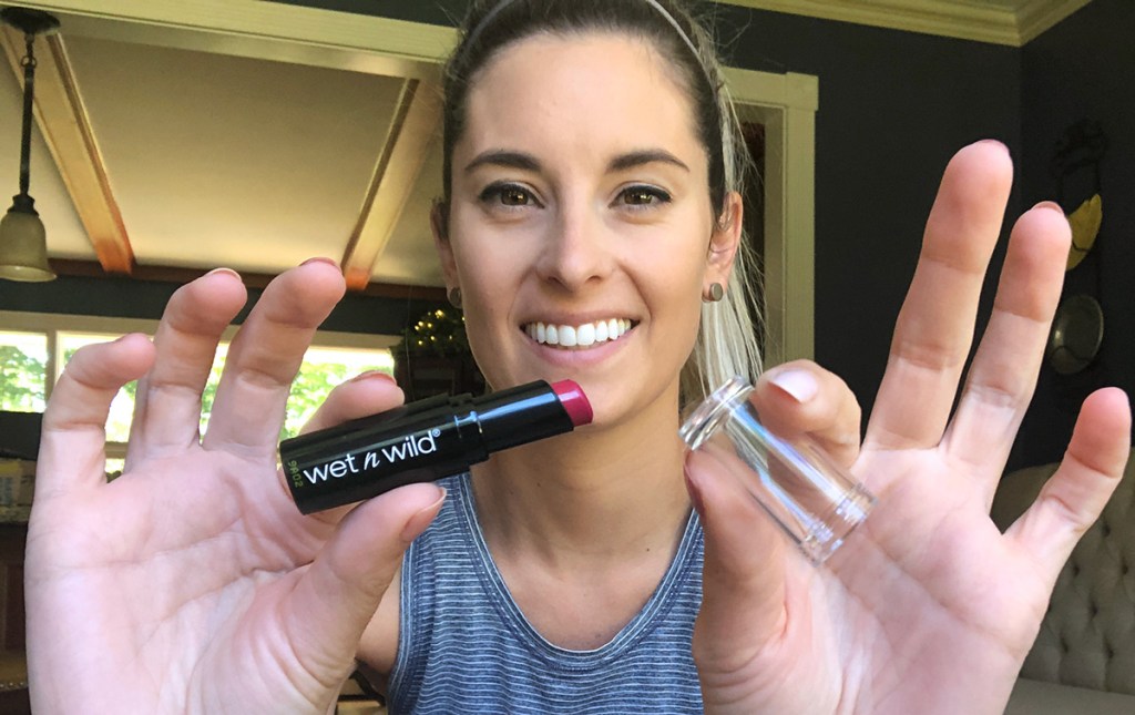 emily holding up wet n wild lipstick