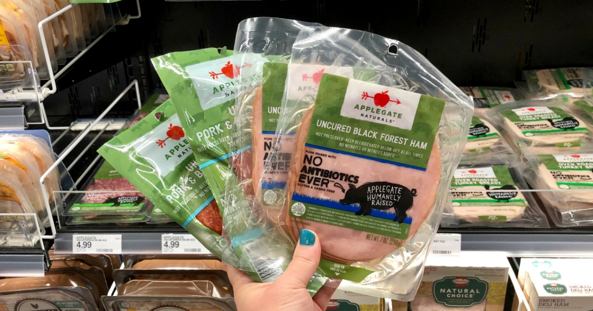 hand holding Applegate Naturals Deli Meat