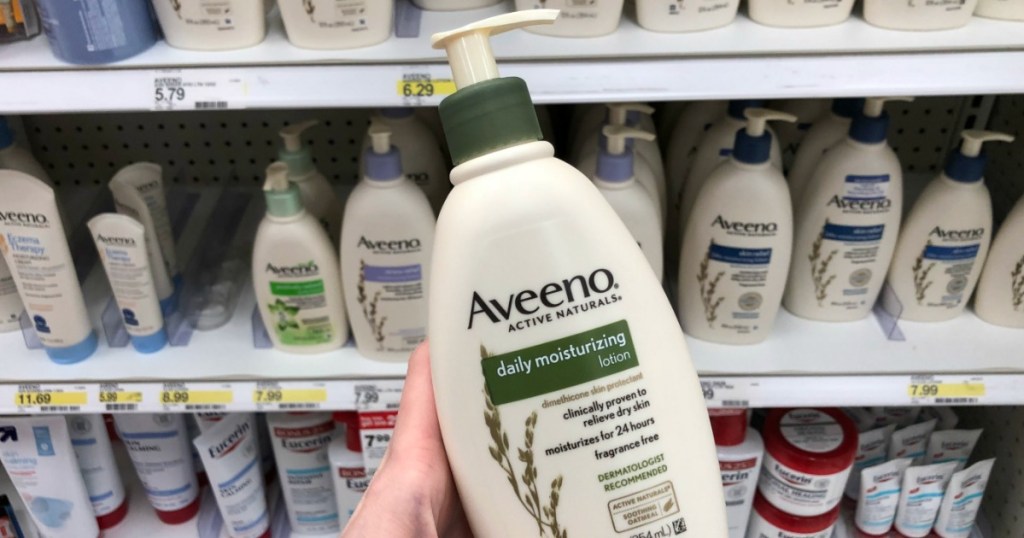hand holding Aveeno Lotion at Target