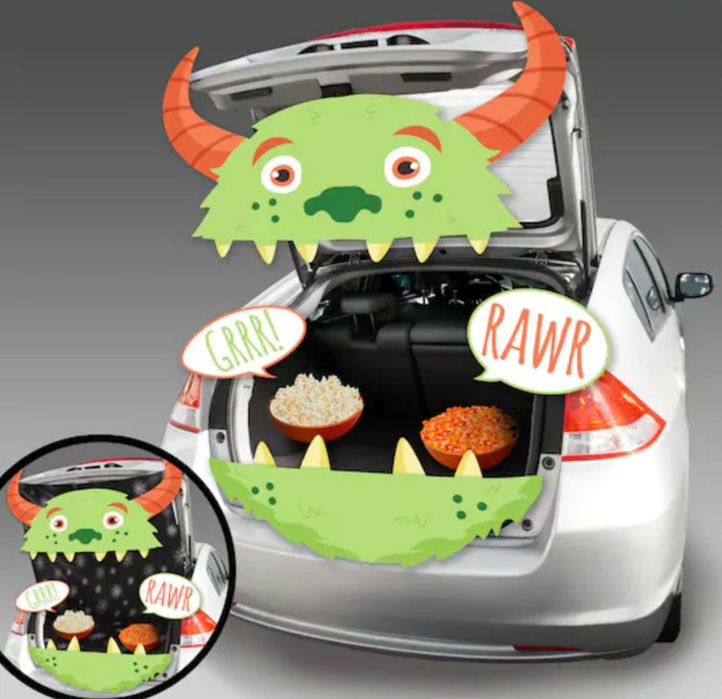Monster themed Trunk or Treat decor kit set up in silver sedan trunk