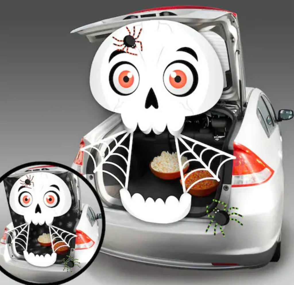 Skeleton themed Trunk or Treat decor kit set up in silver sedan trunk