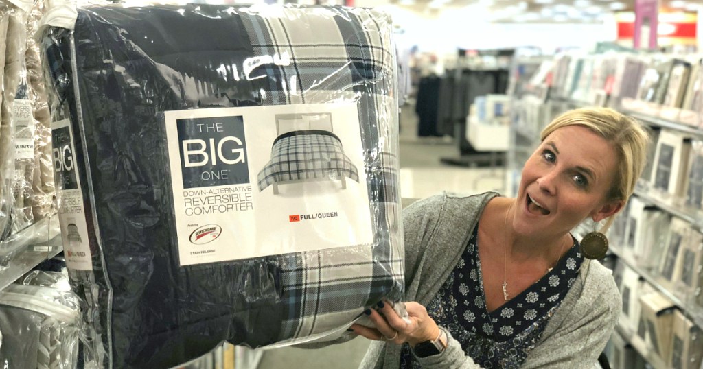 Collin holding The Big One comforter