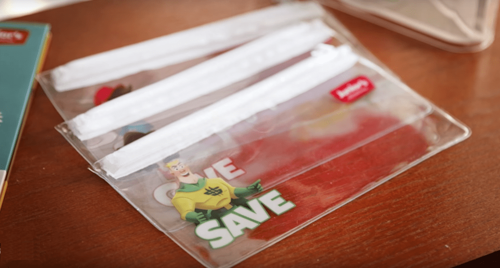 Dave Ramsey's Financial Peace Junior Kit for Kids envelops on desk