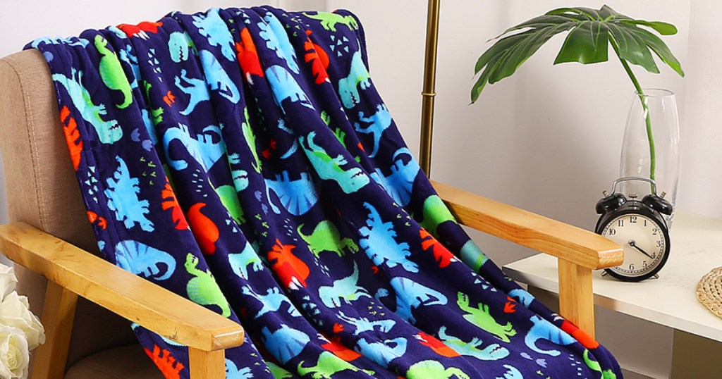 dino cozy throw on chair