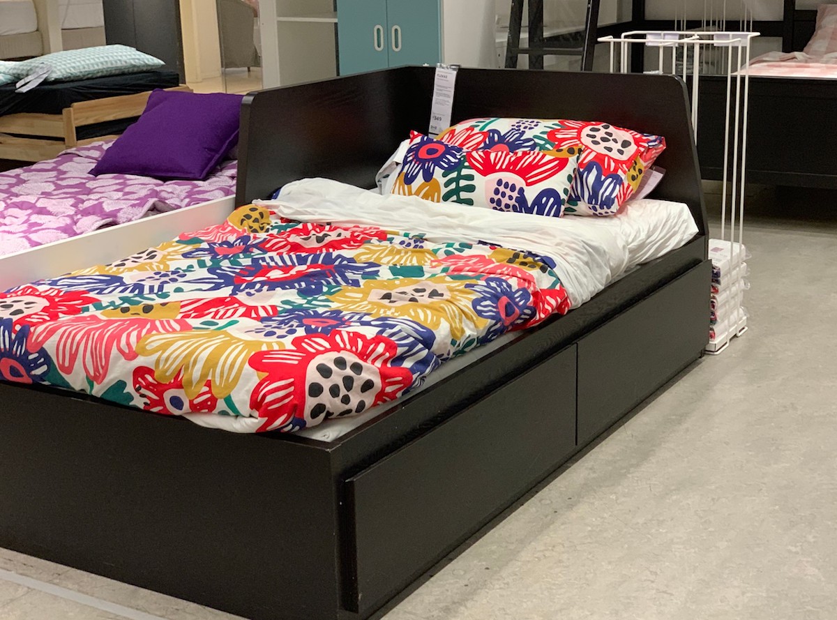 flekke daybed with colorful floral bedspread comforter