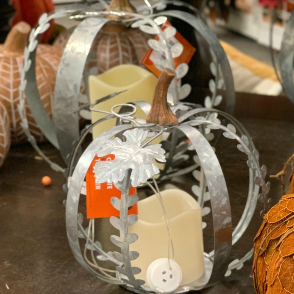 Metal pumpkins on display at store