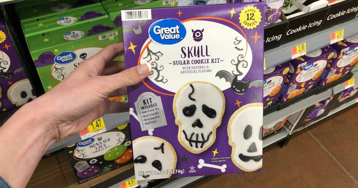 woman holding Great Value Skull Sugar Cookie Kit in Walmart