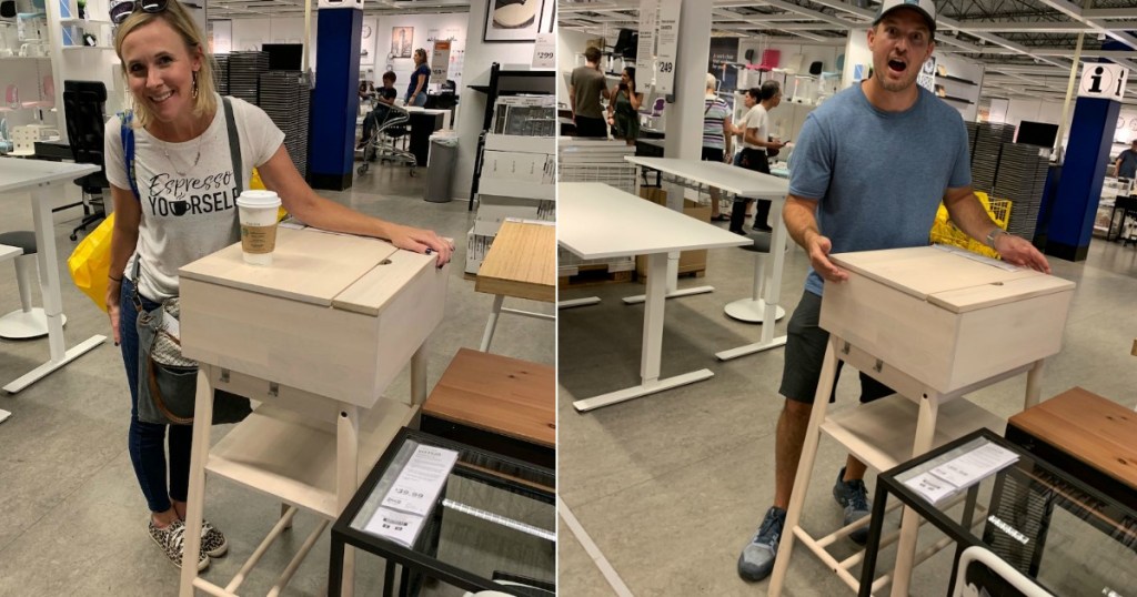 man and woman standing by IKEA standing desks 