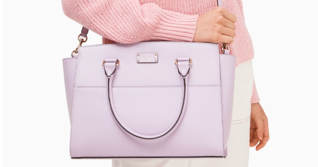 woman holding Kate Spade Grove Street Lana