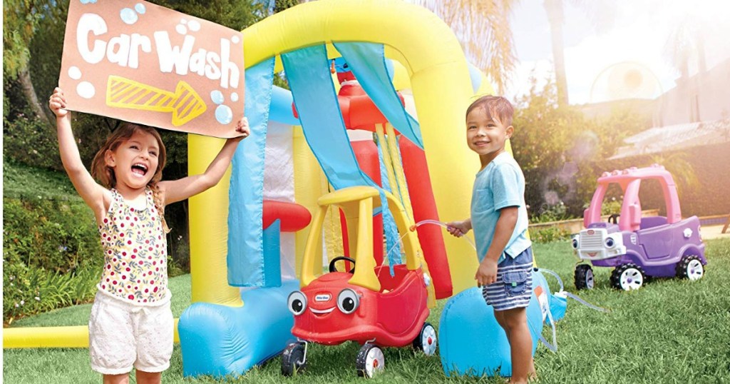 Kids playing outside in Little Tikes Wacky Wash