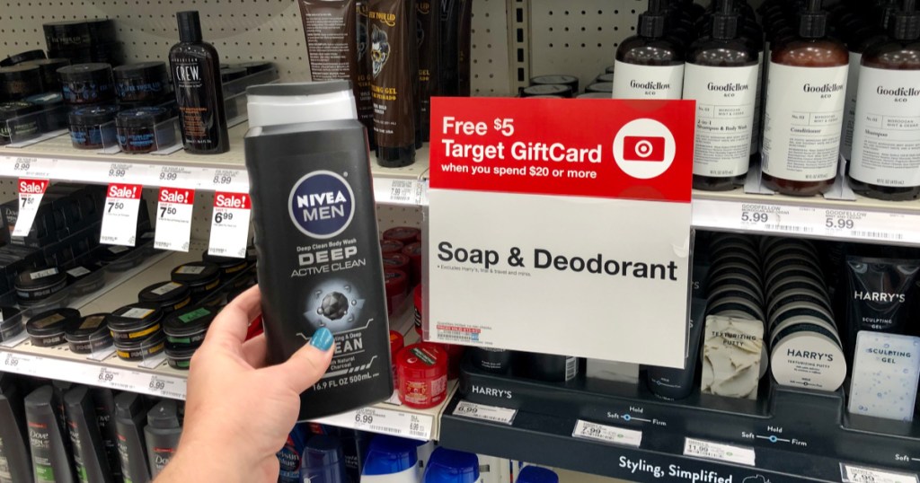 hand holding up bottle of nivea men body wash at target