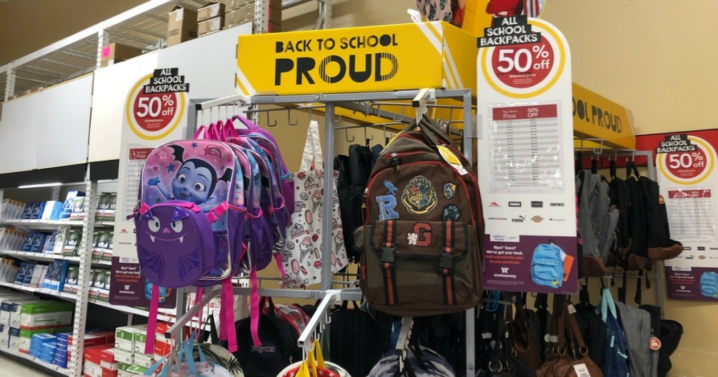 backpacks hanging on a display at Office Depot