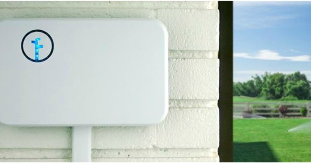 Rachio Smart Sprinkler 8-Zones Controller on a house 