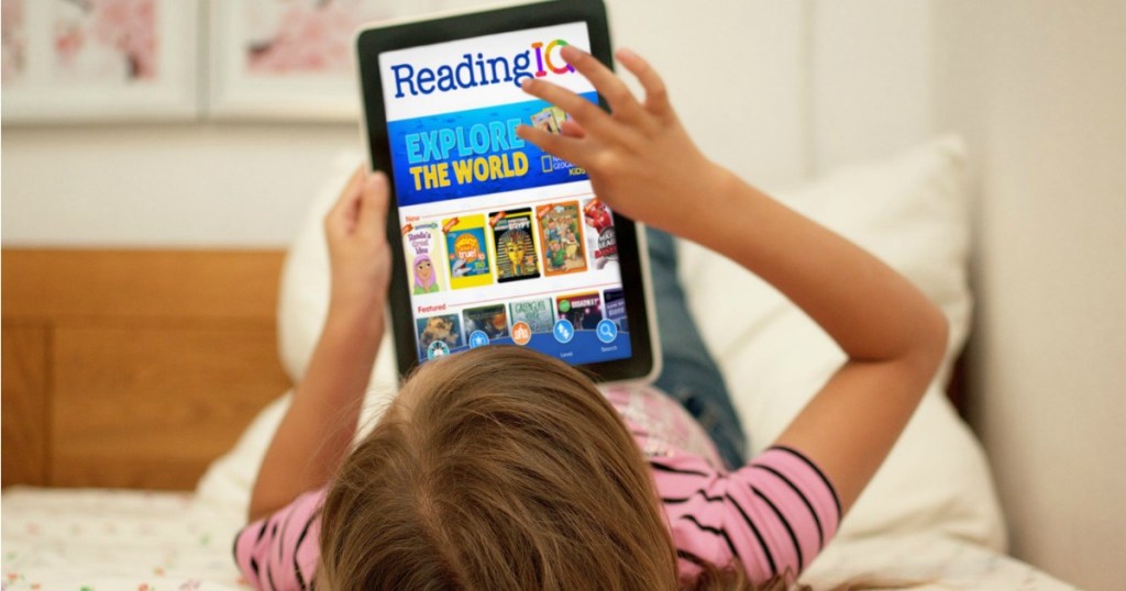 Girl on bed using ReadingIQ on her iPad