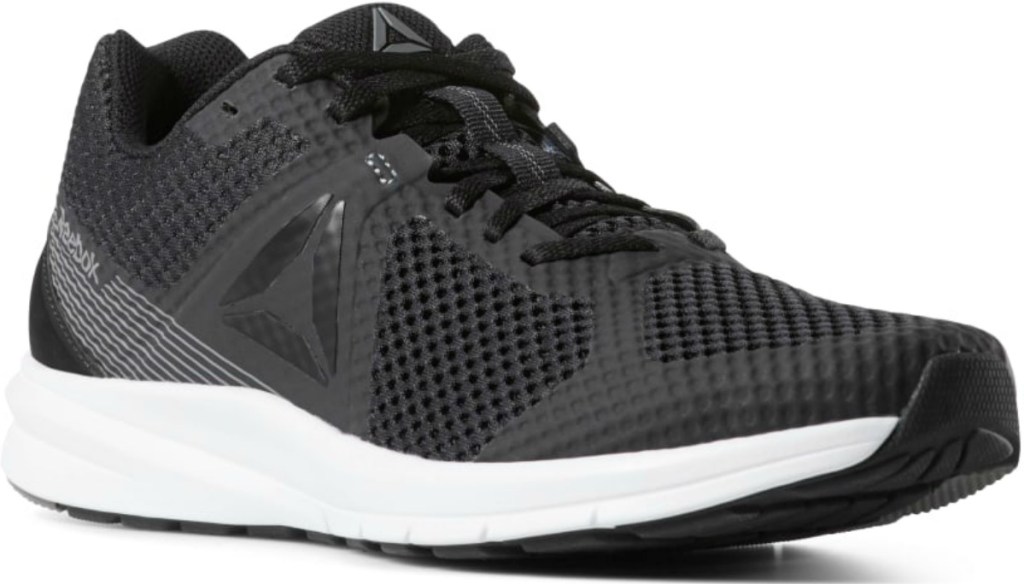 Reebok brand shoe in black and white