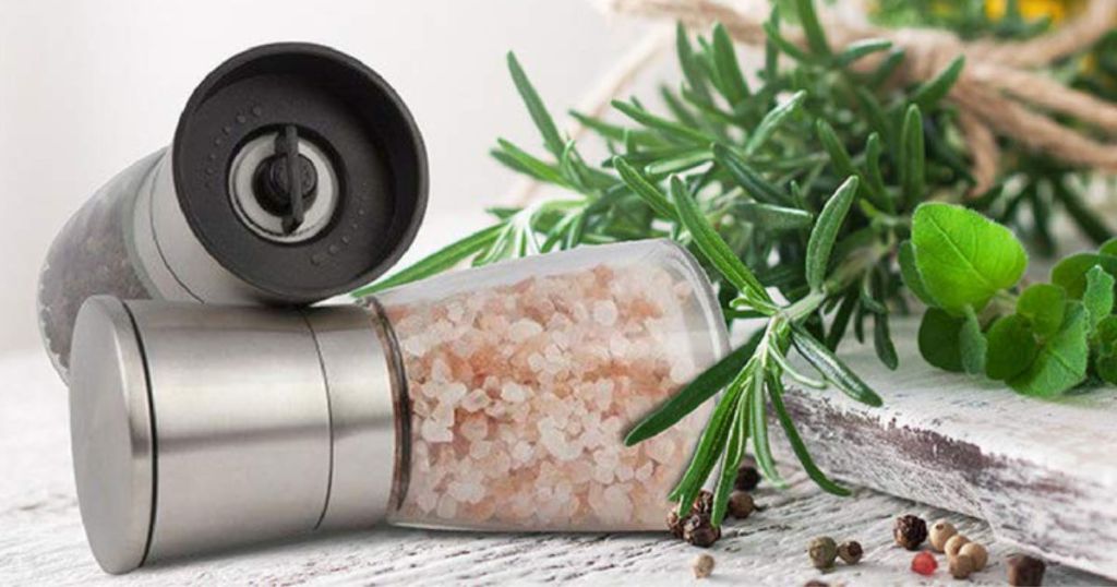 stainless steel grinder set with herbs