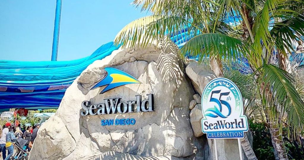 Sea World San Diego front with rocks and palm trees