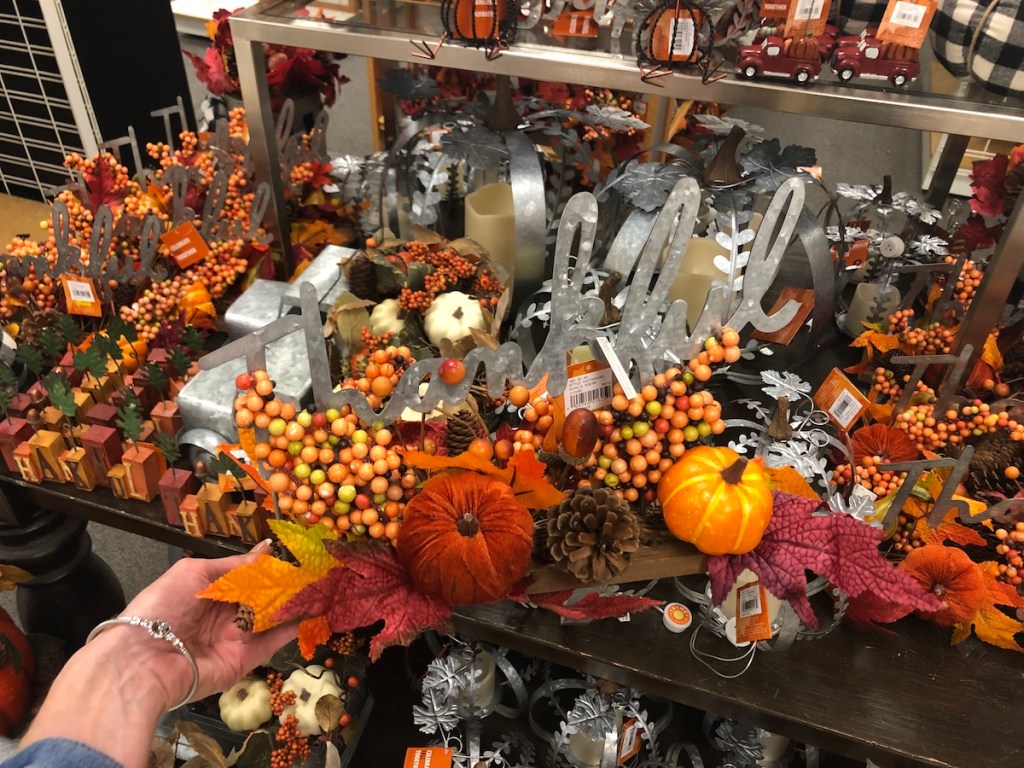 hand holding Thankful Table Decor