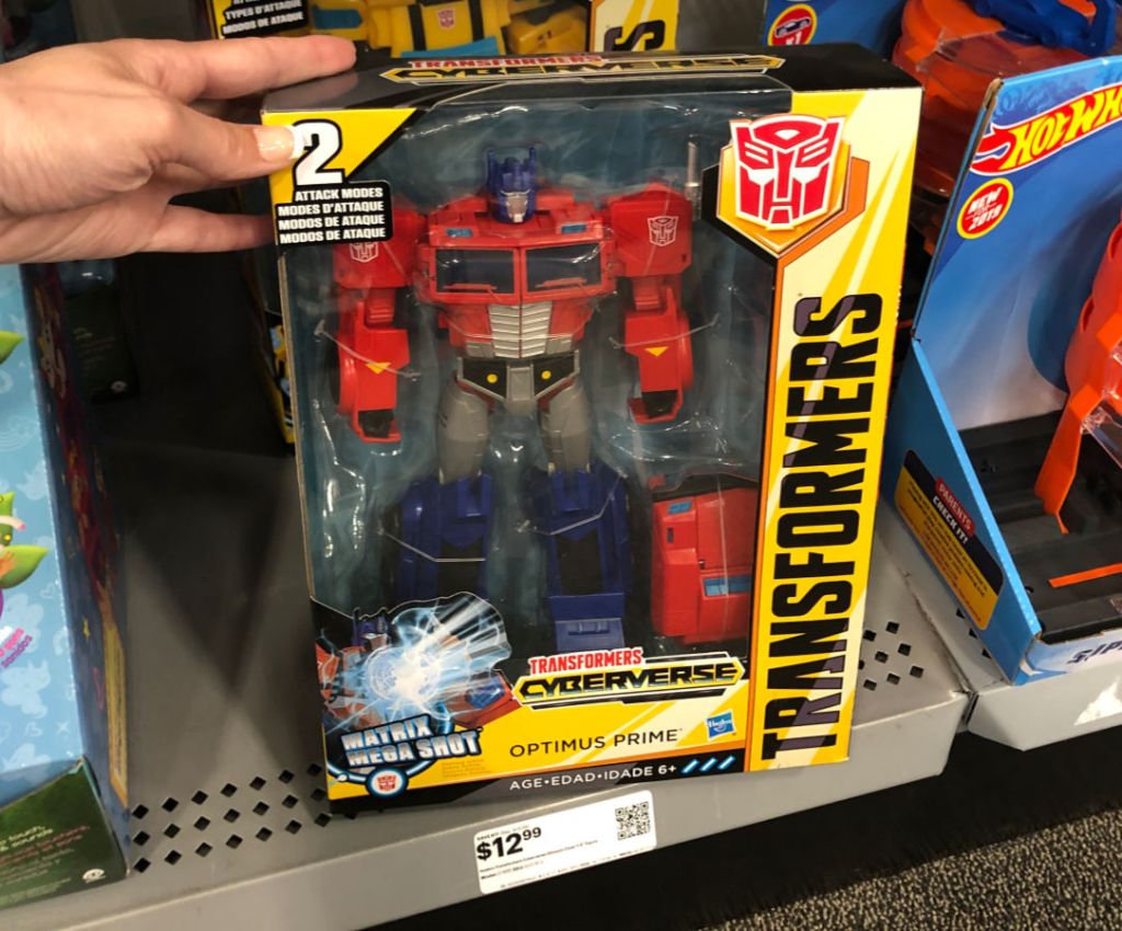 hand holding Transformers cyberverse at best buy