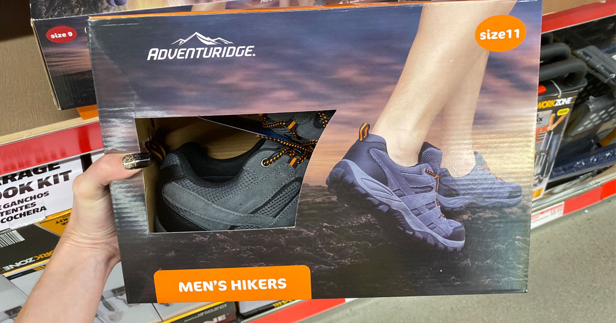 hand holding adventuridge men's hikers at aldi