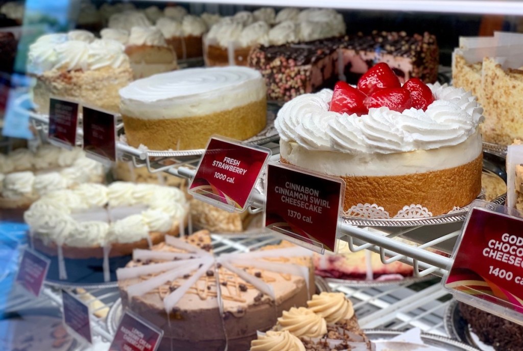 cheesecakes in cooler on display