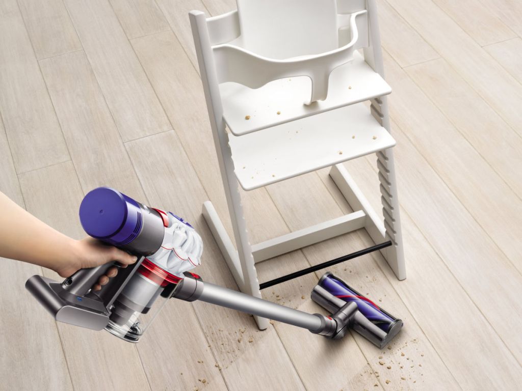 dyson allergy v7 vacuuming around highchair