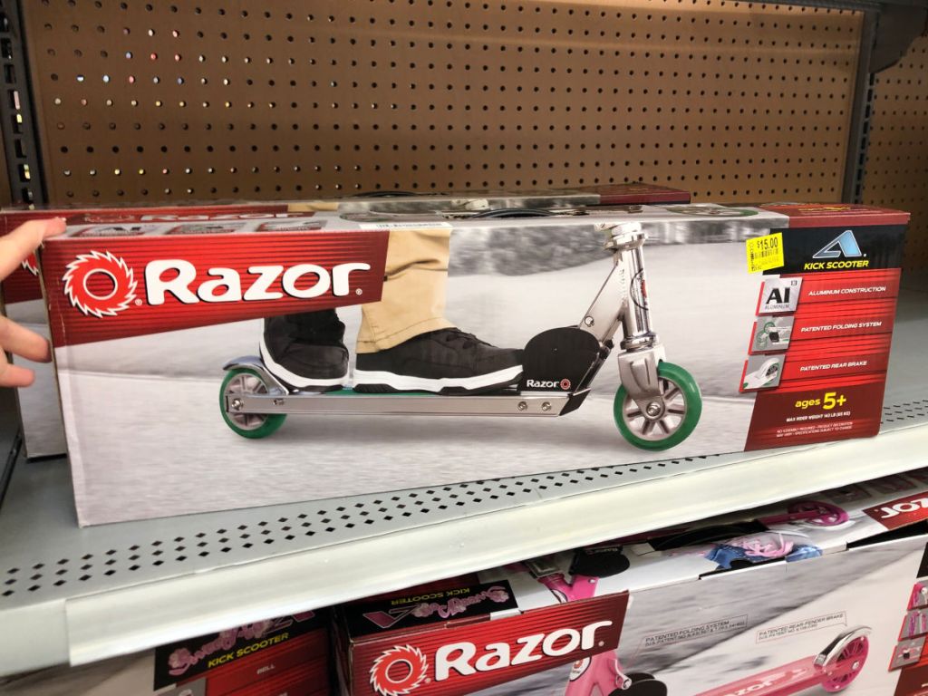 green razor scooter on shelf at walmart