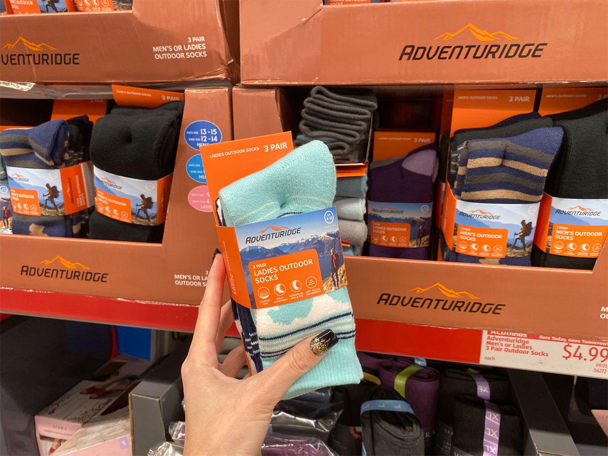 hand holding adventuridge ladies outdoor socks at aldi