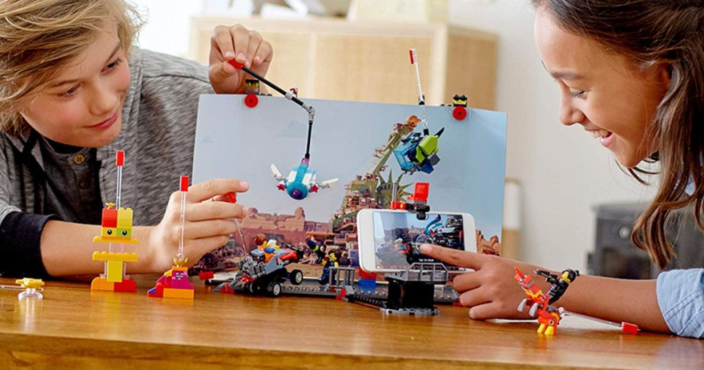 kids playing with lego movie set