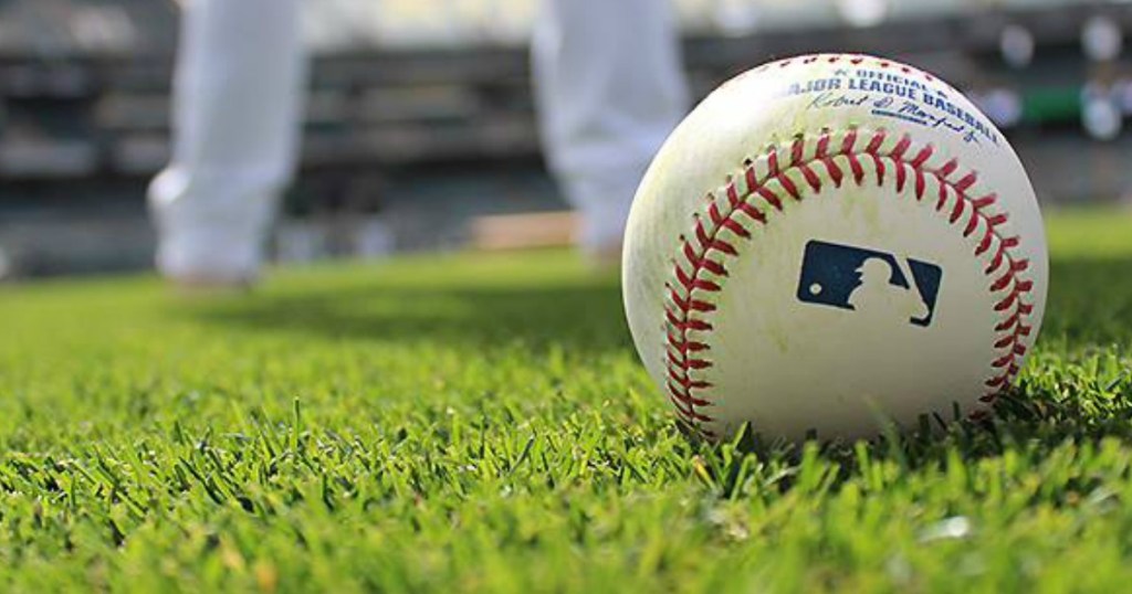 major league baseball ball on field