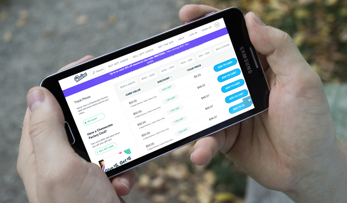 hands holding phone with raise app deals