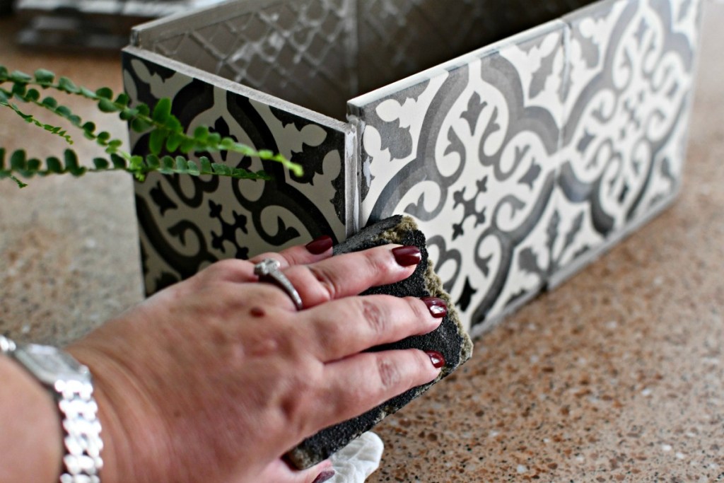 sanding glue off of the edges of tile planter