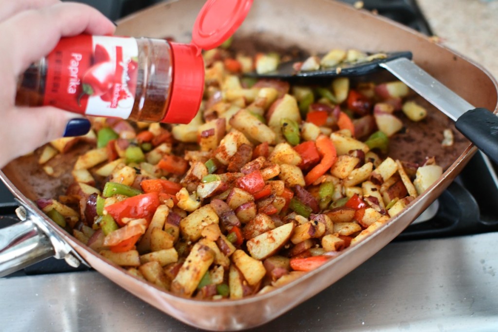 seasoned breakfast potatoes for burritos in a skillet