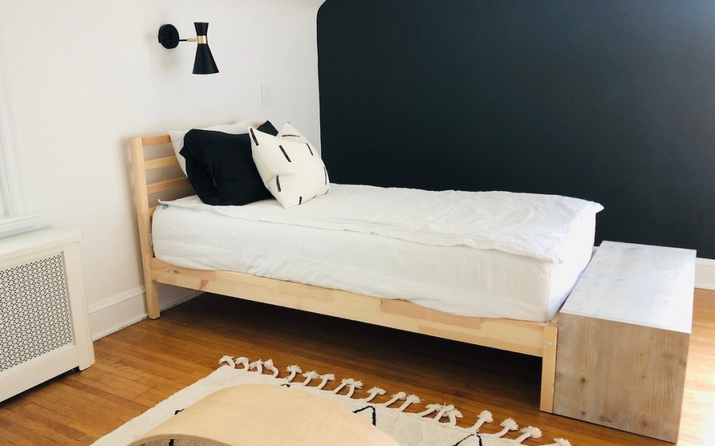 kids IKEA TARVA bed with white bedding