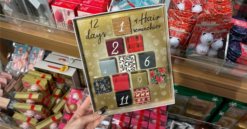 Woman holding 12 Days of Hair Scrunchies Advent Calendar Set