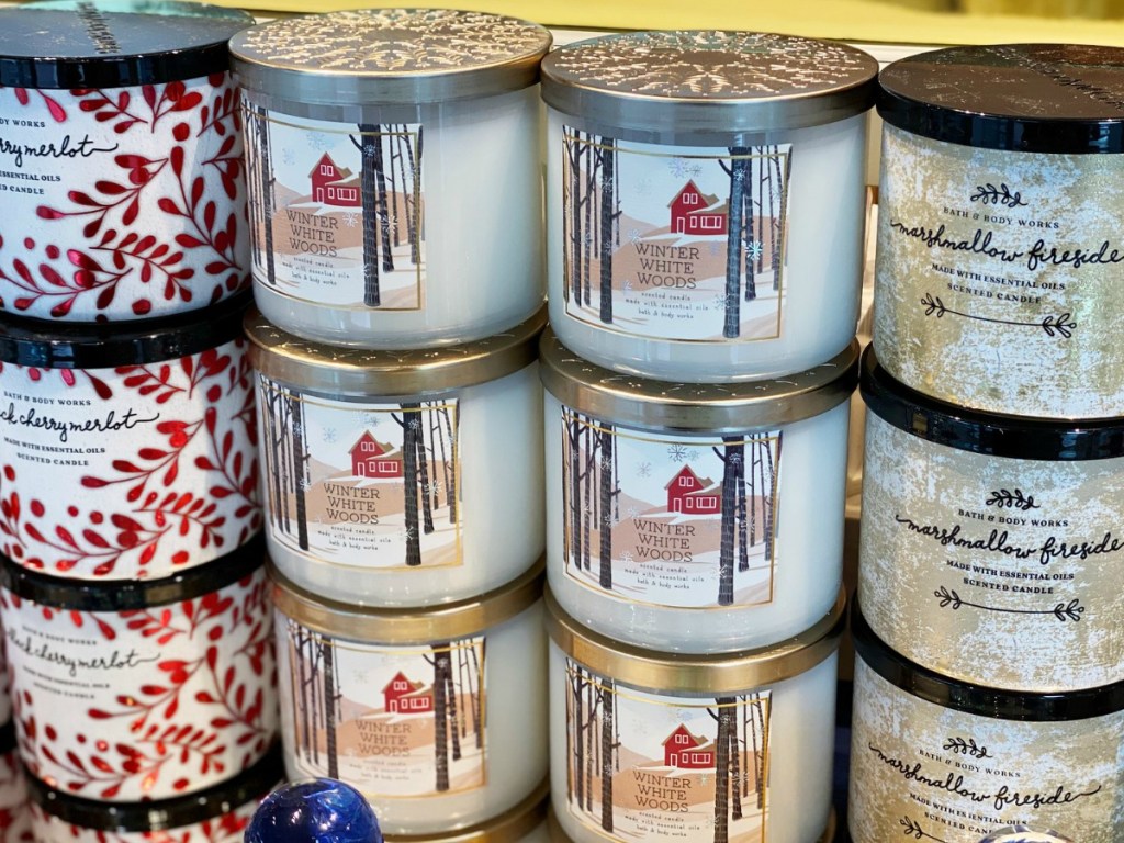 Bath & Body Works winter scents 3-Wick Candles stacked in-store display