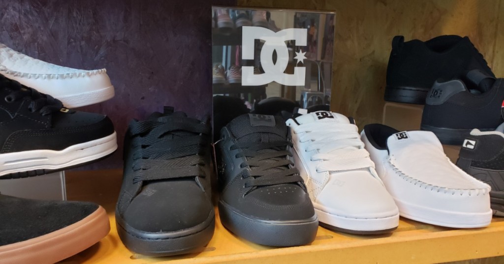 pairs of dc shoes on shelf at store