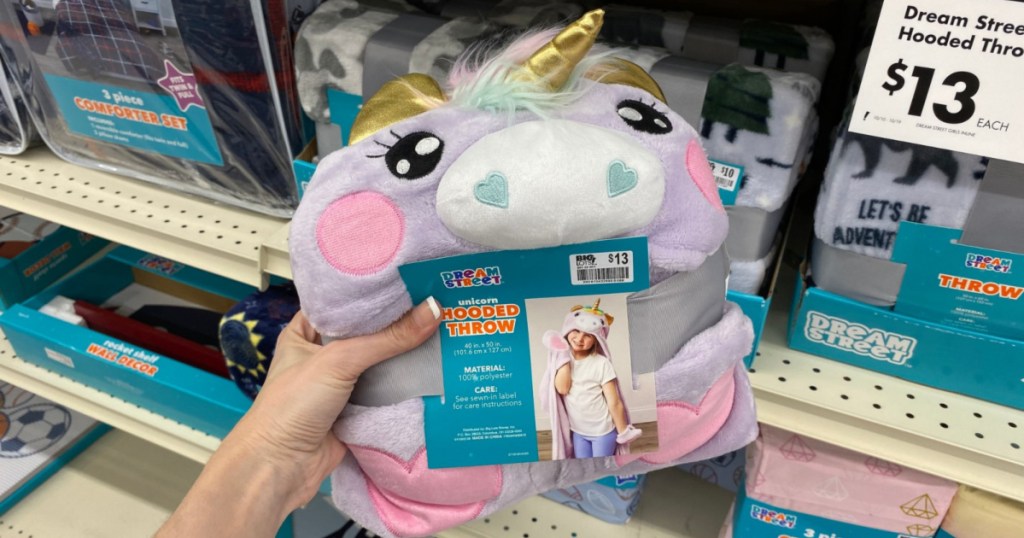 hand holding up unicorn hooded throw blanket at big lots