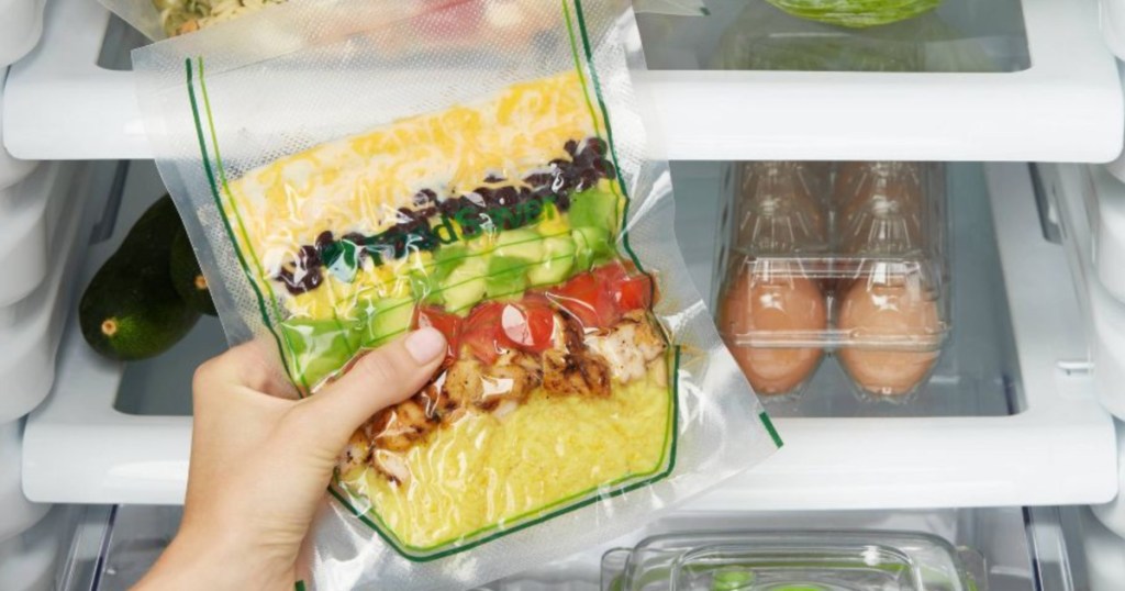 hand holding up food saver bag