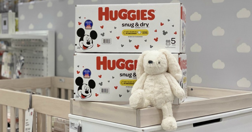 Huggies Diapers next to bunny on changing table